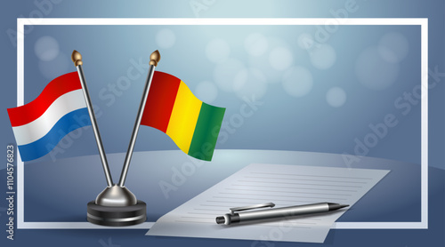 Netherlands and Guinea Small national flag on bokeh background, cooperative relationship