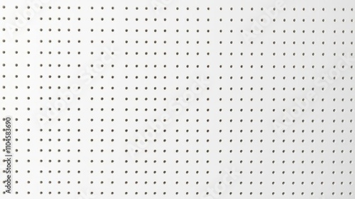 Seamless white peg board texture with evenly spaced holes and uniform design, backdrop, stock photo