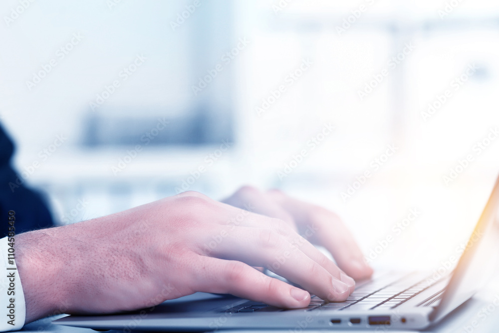 Hands of a businessman on keyboard. Mixed media Hands of a businessman on keyboard. Mixed media