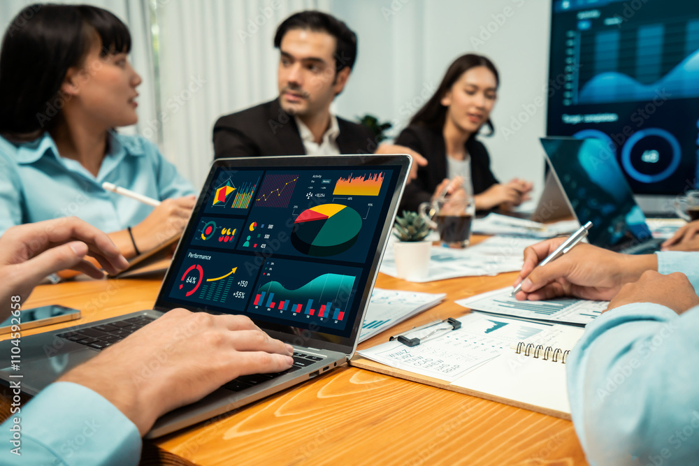 Financial data analysis dashboard by Fintech BI or business intelligence display on laptop screen to in-depth financial data analysis by business people working on business marketing. Habiliment Financial data analysis dashboard by Fintech BI or business intelligence display on laptop screen to in-depth financial data analysis by business people working on business marketing. Habiliment