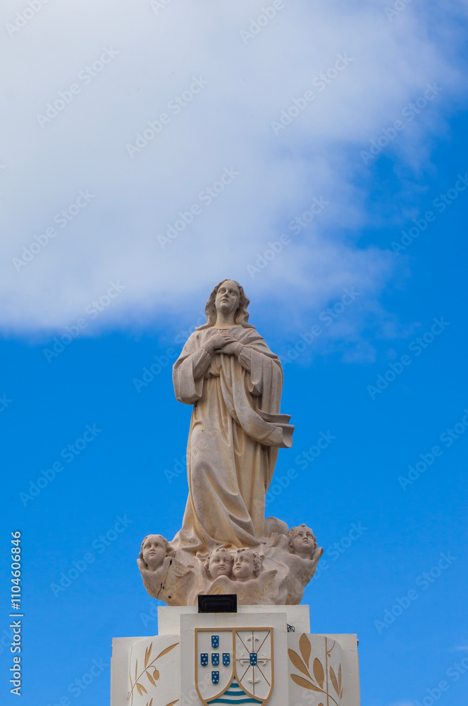 Statue of the Virgin Mary (Mother Mary) in a park in Dili City, Timor Leste. Statue of the Virgin Mary (Mother Mary) in a park in Dili City, Timor Leste.