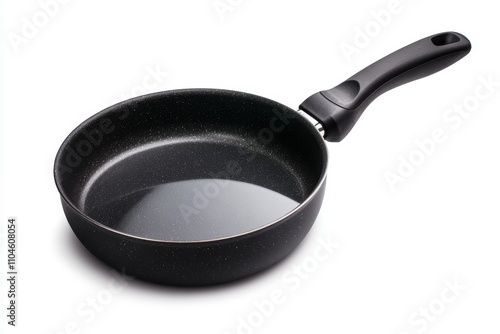 A black pan with a handle is sitting on a white background