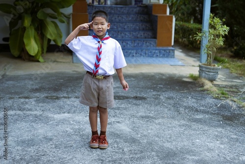 Thai boy in white scout uniform