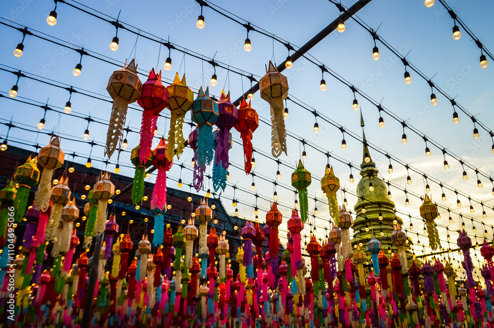 Fototapeta premium Light and Color in colorful​ Lantern​ Festival​ at Wat Phra That Hariphunchai in Lamphun, Thailand, South East Asia