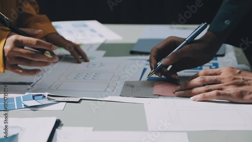 Wallpaper Mural UX developer and ui designer brainstorming about mobile app interface wireframe design with customer breif and color code. business working Torontodigital.ca