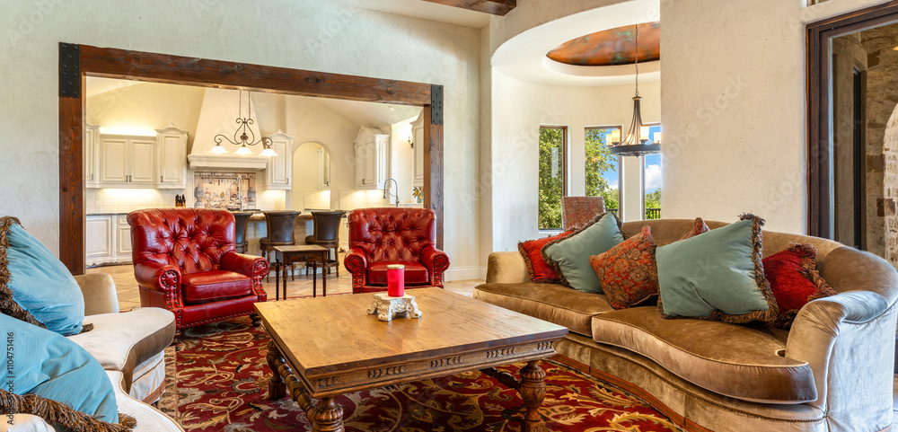 Cozy living room with elegant furniture and warm ambiance in a spacious home Cozy living room with elegant furniture and warm ambiance in a spacious home