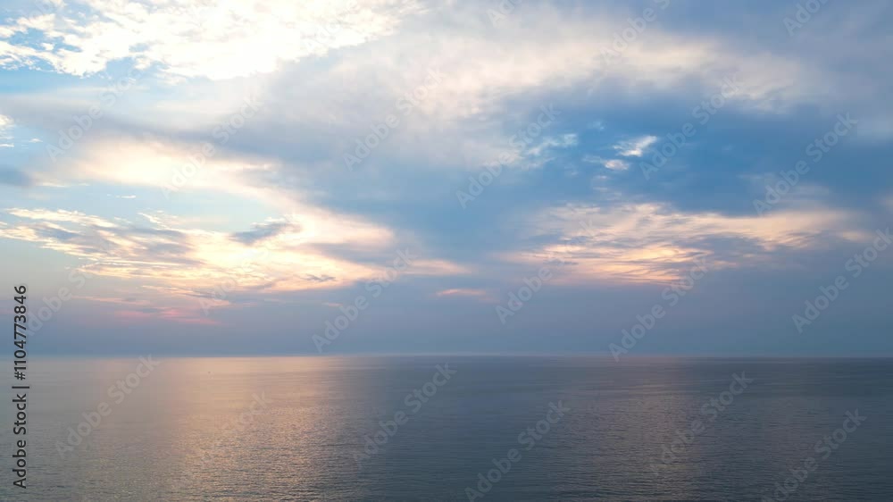 Aerial view of Lake Michigan coast during twilight with dramatic sky. Aerial view of Lake Michigan coast during twilight with dramatic sky.