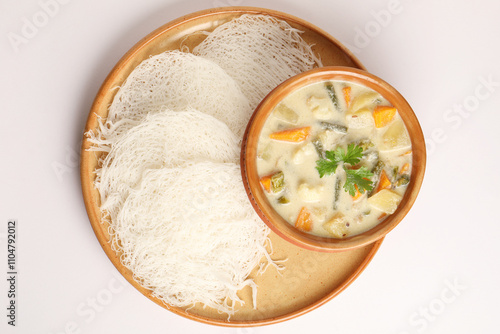 Iddiyappam and vegetable kurma made in coconut milk, A south Indian breakfast or dinner