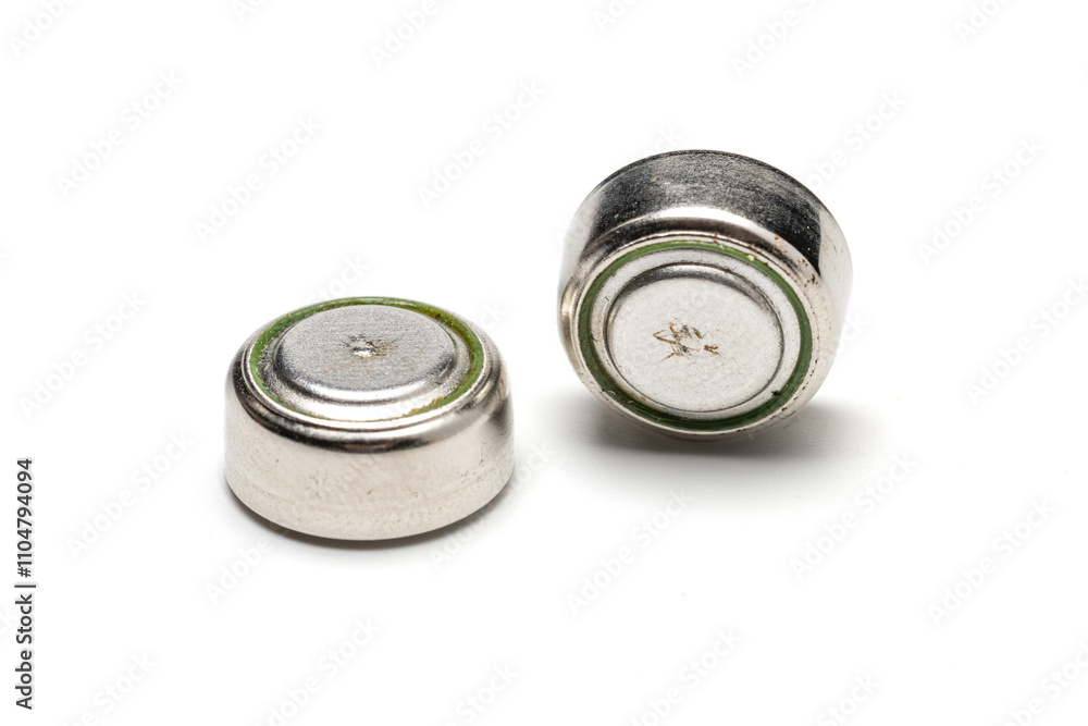 close up view of LR44 button cells or battery. Isolated in white background.