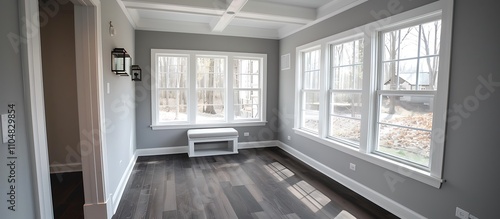 Wallpaper Mural Sunroom with white windows, gray walls, dark wood floors, small window seat, white beamed ceiling, home decor style. Torontodigital.ca