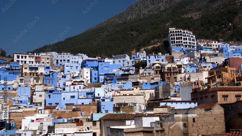 Blue and white buildings in the medina, on a a hill, in Chefchaouen, Morocco Blue and white buildings in the medina, on a a hill, in Chefchaouen, Morocco