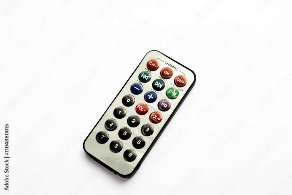 MP3 remote control, remote control for mp3 player, close up on remote control on white background, small remote on white background. MP3 remote control, remote control for mp3 player, close up on remote control on white background, small remote on white background.