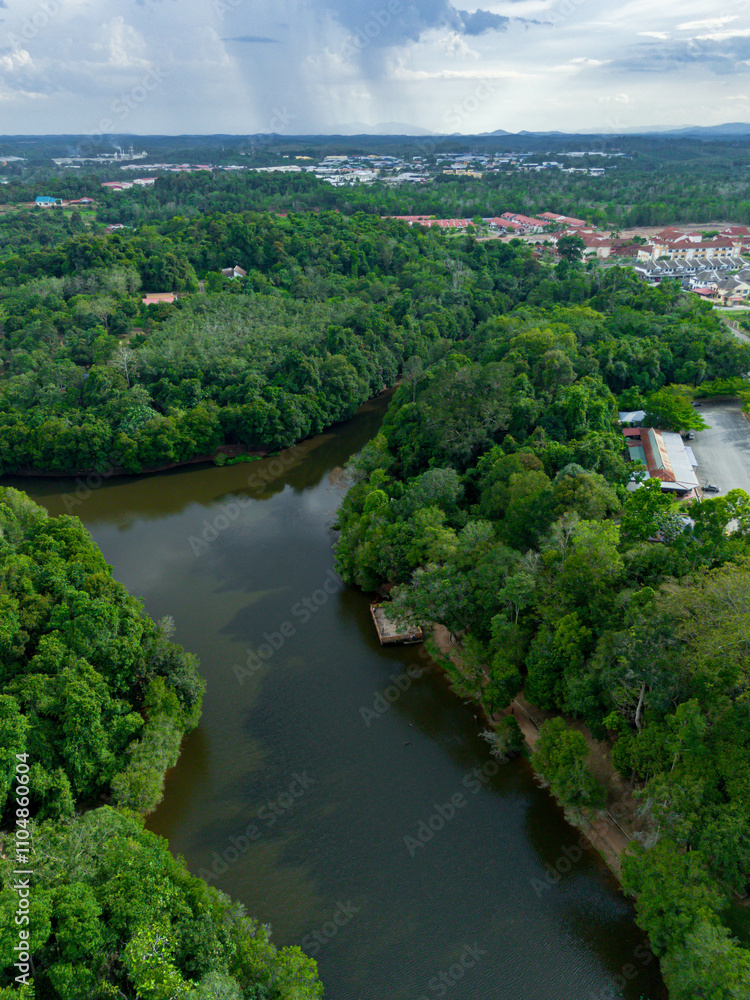 Aerial drone view of Chatin Lake or Tasik Chatin surrounded by greenery trees at Mentakab, Pahang, Malaysia. Aerial drone view of Chatin Lake or Tasik Chatin surrounded by greenery trees at Mentakab, Pahang, Malaysia.