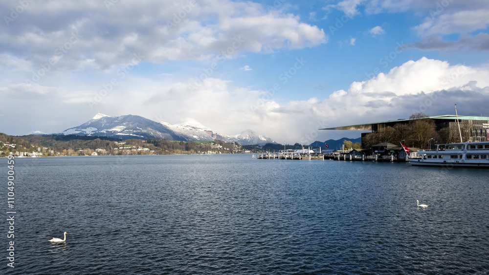 Charming view of Lake Lucerne from Lucerne, Switzerland, on a sunny spring day. Charming view of Lake Lucerne from Lucerne, Switzerland, on a sunny spring day.