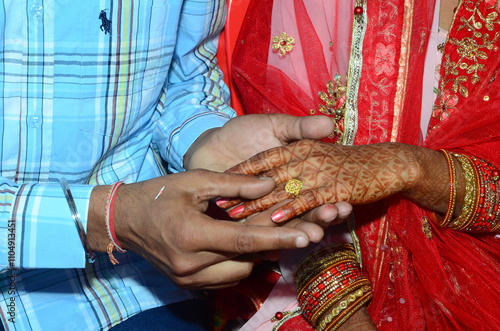 bride and groom hold each other  hand before starting the marriage rituals in indian marriage 4 photo