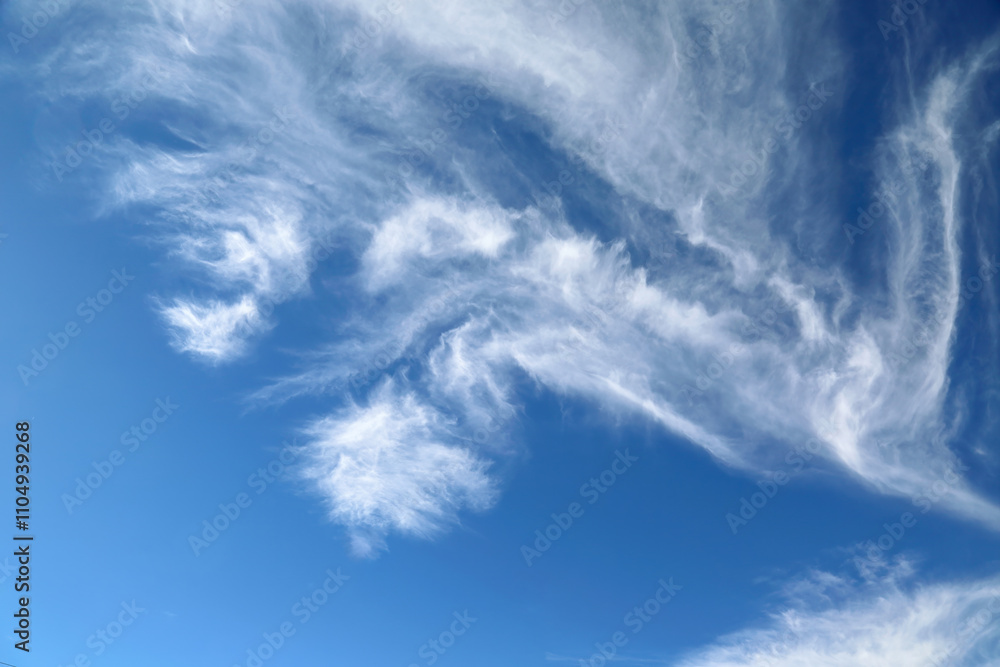 Scenic dramatic summer clouds. Cloudscape of bright blue sky. Cloud background Scenic dramatic summer clouds. Cloudscape of bright blue sky. Cloud background