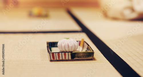 Obraz na plátně Serving, ceremony and sweet with wagashi on tatami floor for traditional, Japanese delicacy and zen
