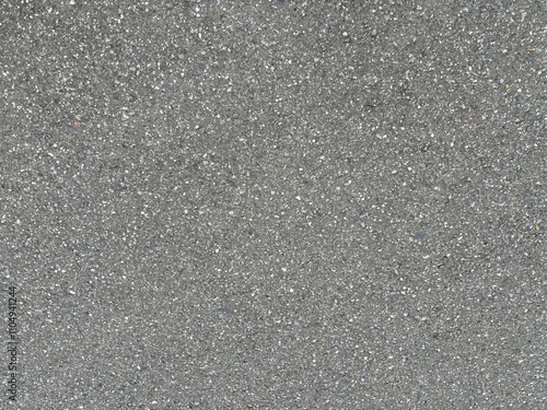 The texture of gray asphalt on a road