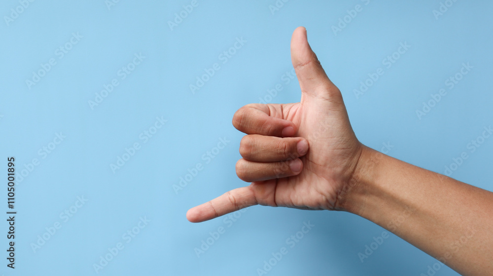 Hand gesture call me isolated on blue Hand gesture call me isolated on blue