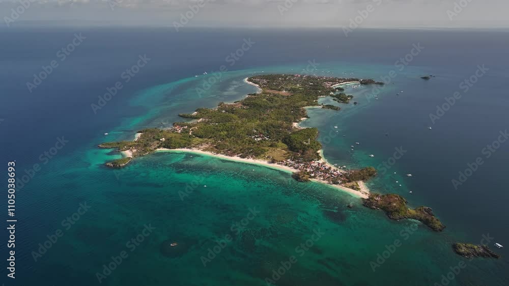 Langub Beach And Lapus Lapus Island Surrounded By Blue Sea In Cebu, Philippines. - aerial shot Langub Beach And Lapus Lapus Island Surrounded By Blue Sea In Cebu, Philippines. - aerial shot