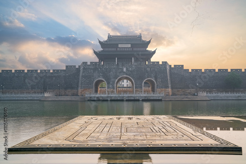 Beautiful scenery of the ancient city wall ruins and moat and bridge in Suzhou, Jiangsu Province, China
