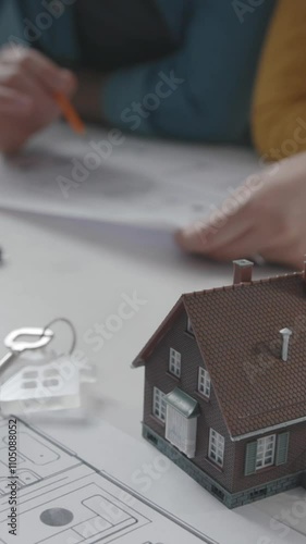 Young couple working on their new house project