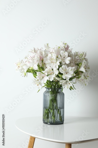 Wallpaper Mural Beautiful white alstroemeria 
in a vase on the table Torontodigital.ca