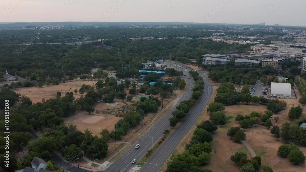 Drone tilts down over Airport Blvd in Mueller of Austin, Texas Drone tilts down over Airport Blvd in Mueller of Austin, Texas