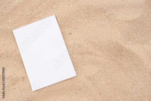 Bild auf Leinwand blank magazine mockup on sandy beach