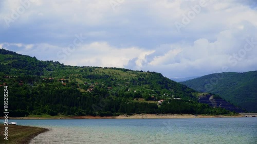Wallpaper Mural Beautiful mountain landscape with calm water and green hills in the distance Torontodigital.ca