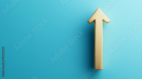 Solid gold upward arrow on a blue background symbolizing growth and success