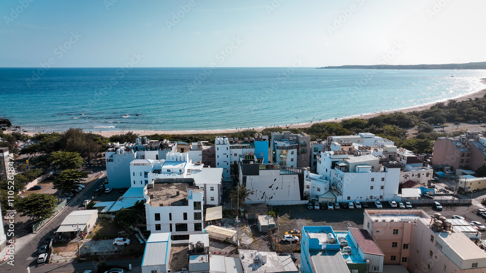 Obraz premium Aerial view of coastal buildings near Baishawan beach in Kenting Taiwan under bright sunny sky