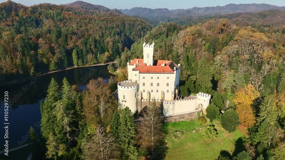 Amazing autumn video with a drone of the majestic old castle and lake of Trakoscan in Zagorje, northern Croatia Amazing autumn video with a drone of the majestic old castle and lake of Trakoscan in Zagorje, northern Croatia