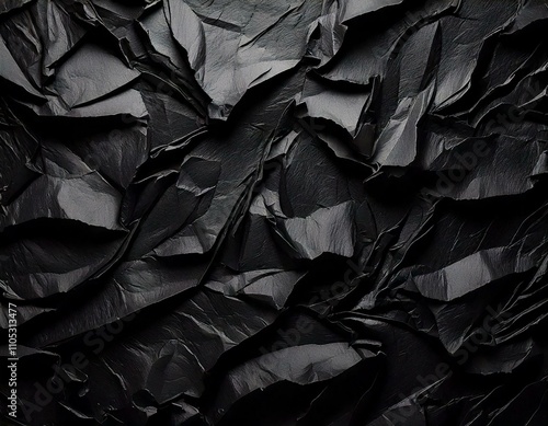 Papier froissé avec plis, texture noir déchiré