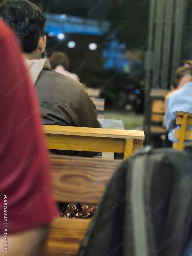Nighttime Café Atmosphere With Warm Wooden Textures And Soft Lights. Nighttime Café Atmosphere With Warm Wooden Textures And Soft Lights.