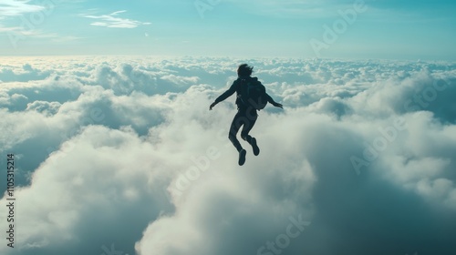 Wallpaper Mural Man leaping between clouds, symbolizing risk-taking and overcoming challenges. - Torontodigital.ca