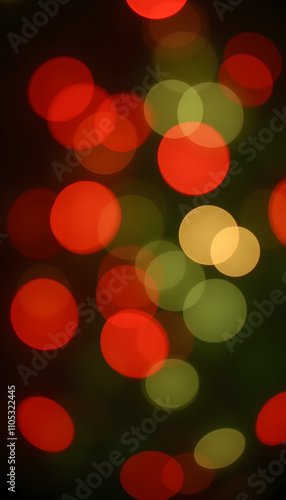 Abstract holiday background with bokeh effect, soft glowing balls of red, green and gold, festive and warm atmosphere.