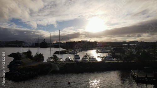 Aerial Drone Shot Over a Marina and Boat Harbor at Dusk in Rogaland, Norway photo