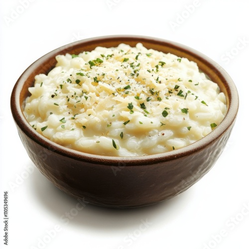 Creamy risotto bowl topped with parmesan cheese and herbs, adding texture and creaminess to the rice, on an isolated white background.