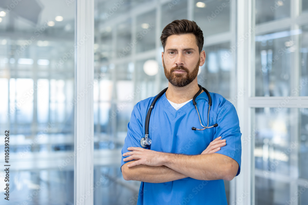 Confident male nurse wearing with stethoscope in modern hospital. He stands with arms crossed, portrays professionalism and trust in healthcare environment. Confident male nurse wearing with stethoscope in modern hospital. He stands with arms crossed, portrays professionalism and trust in healthcare environment.