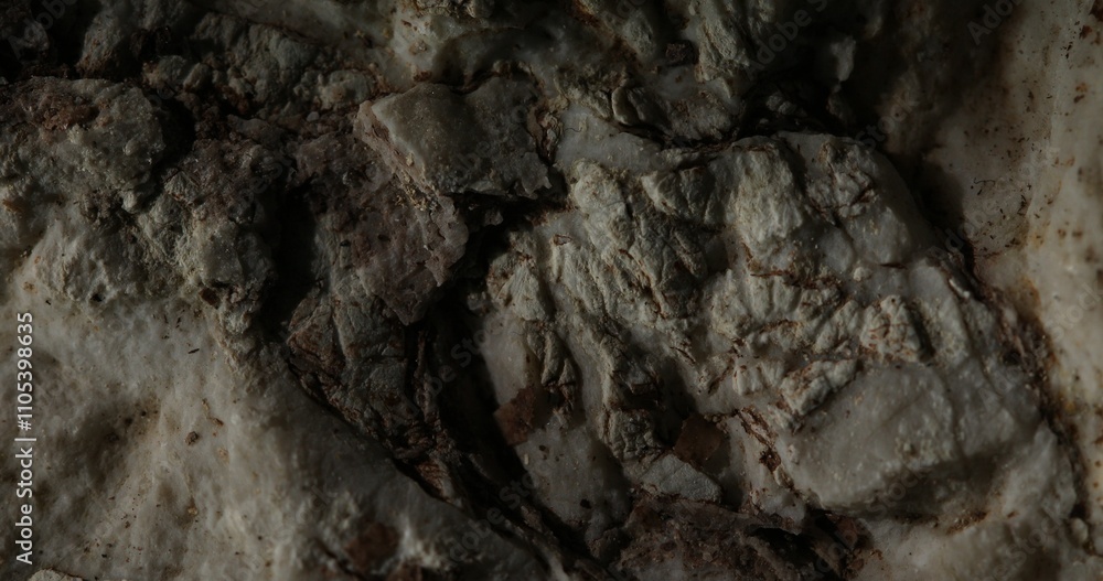 Close-Up of Natural Dark Textured Rock with Eroded Surface Close-Up of Natural Dark Textured Rock with Eroded Surface