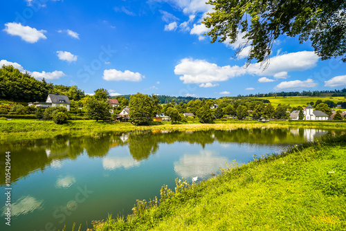 Reservoir on the dam wall at Diemelsee and the surrounding landscape. Nature at the Diemel Dam in the Sauerland.
 photo