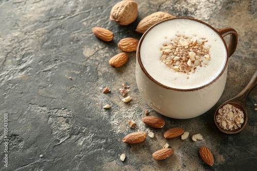 Almond drink and components shown on a rustic background with an organic feel photo