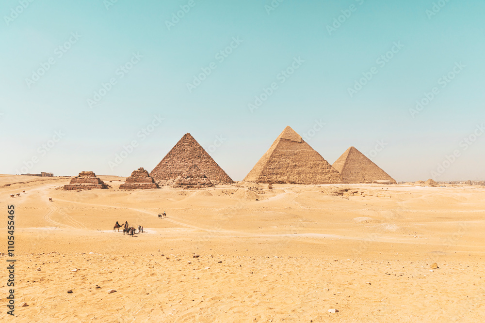 Archaeological complex of Great Egyptian Pyramids is located on the Giza plateau. Pyramids of Chephren Khafra and Cheops Khufu and Mikerina Menkaura. Cairo, Egypt. Archaeological complex of Great Egyptian Pyramids is located on the Giza plateau. Pyramids of Chephren Khafra and Cheops Khufu and Mikerina Menkaura. Cairo, Egypt.