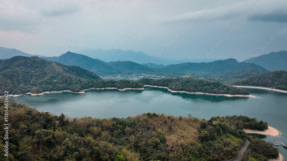Discover the tranquil beauty of Sun Moon Lake, framed by lush mountains and serene waters Discover the tranquil beauty of Sun Moon Lake, framed by lush mountains and serene waters