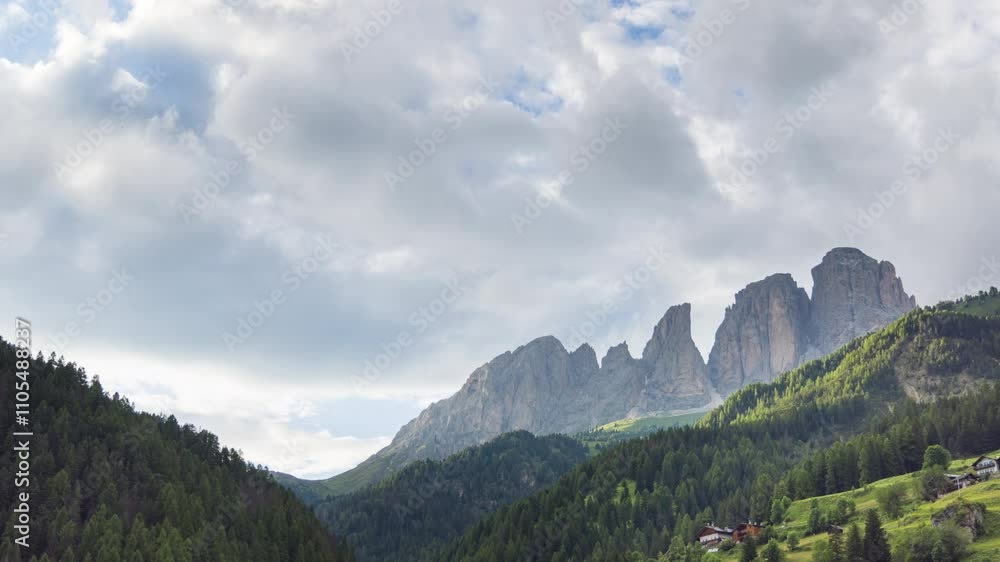 A view of the Sassolungo and the countryside into Val di Fassa - Sunset Timelapse