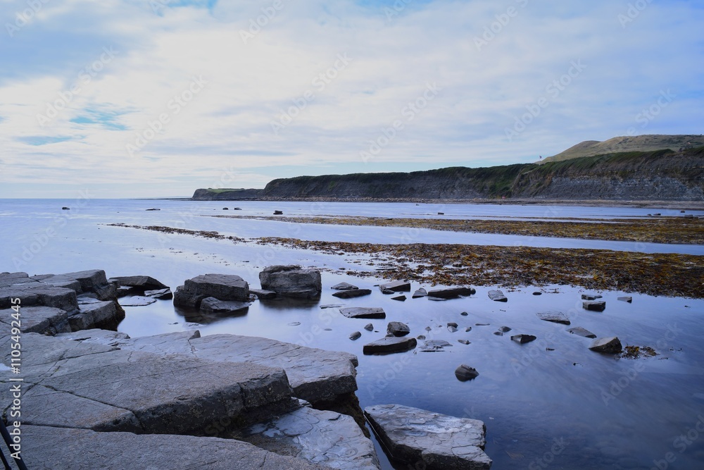 Calm, tranquil scene along the rocky Dorset coast Calm, tranquil scene along the rocky Dorset coast