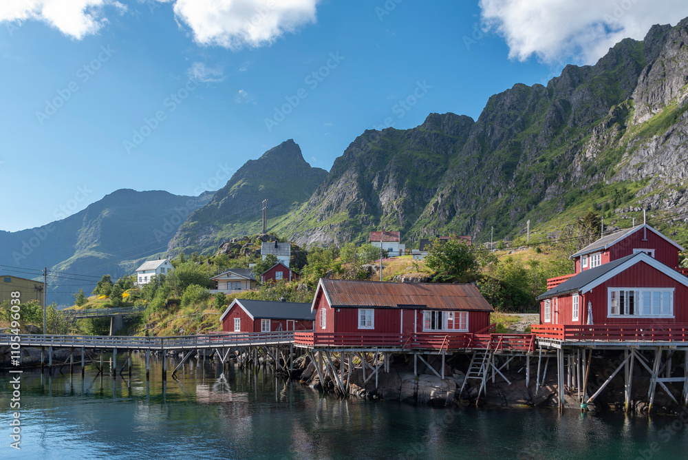 Fototapeta premium Townscape with traditional fishermen's houses, so-called Rorbuer. A i Lofoten in Lofoten district of Norway