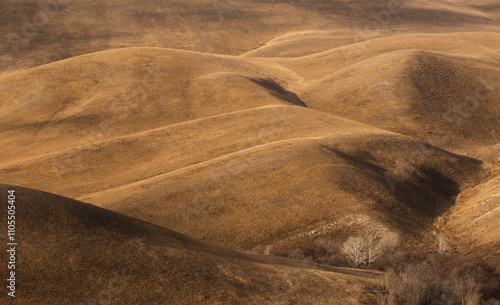 Photography monochrome natural landscape with hills at sunrise or sunset in off-season