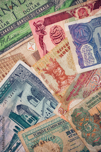 Background from paper money of the different countries.financial economy background for desktop wallpaper. Money Texture.The concept of wealth, profits, business, finance.